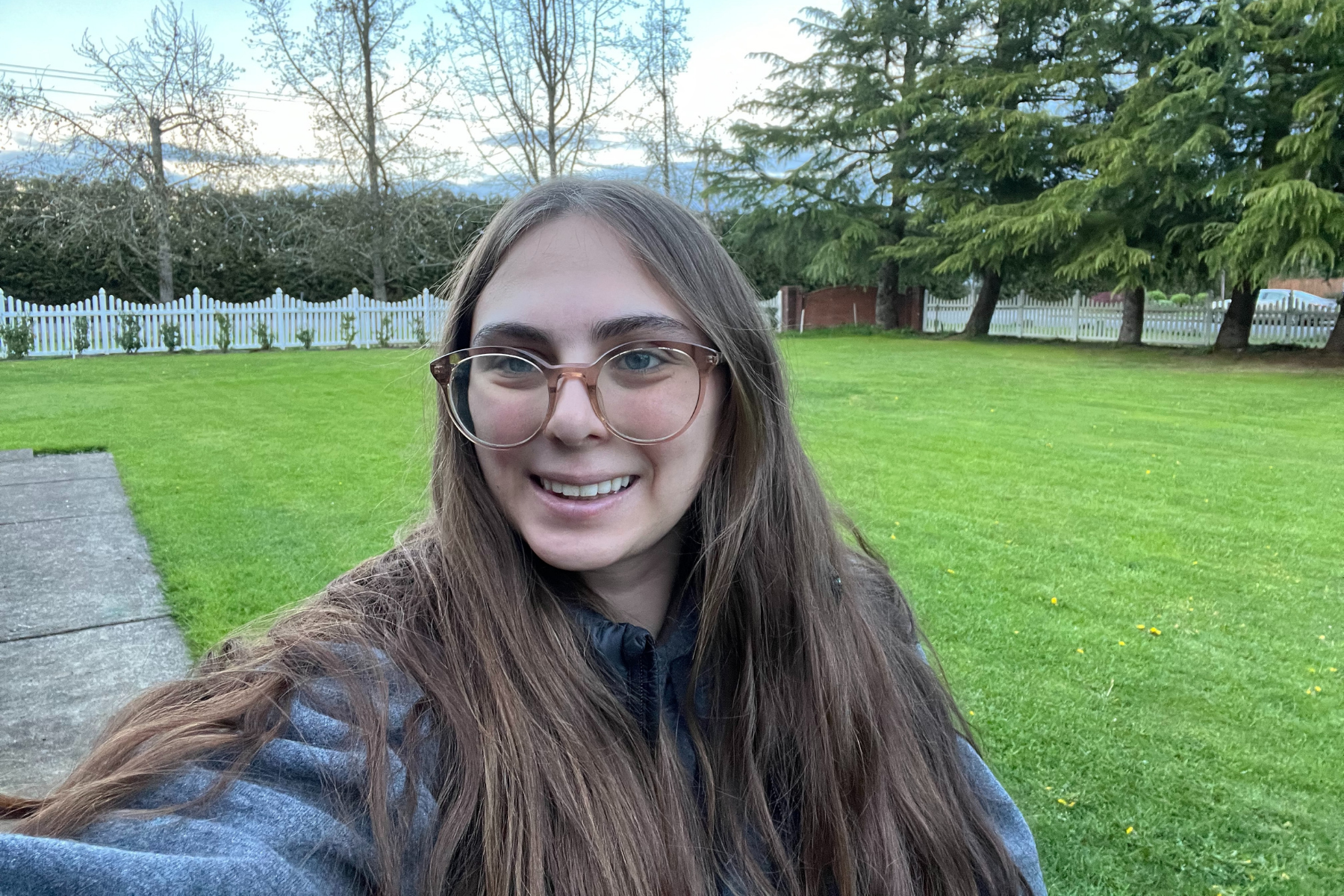 woman smiling in the outdoors