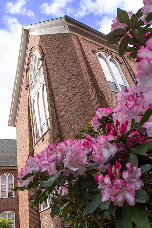 Campbell Hall with flowers in front