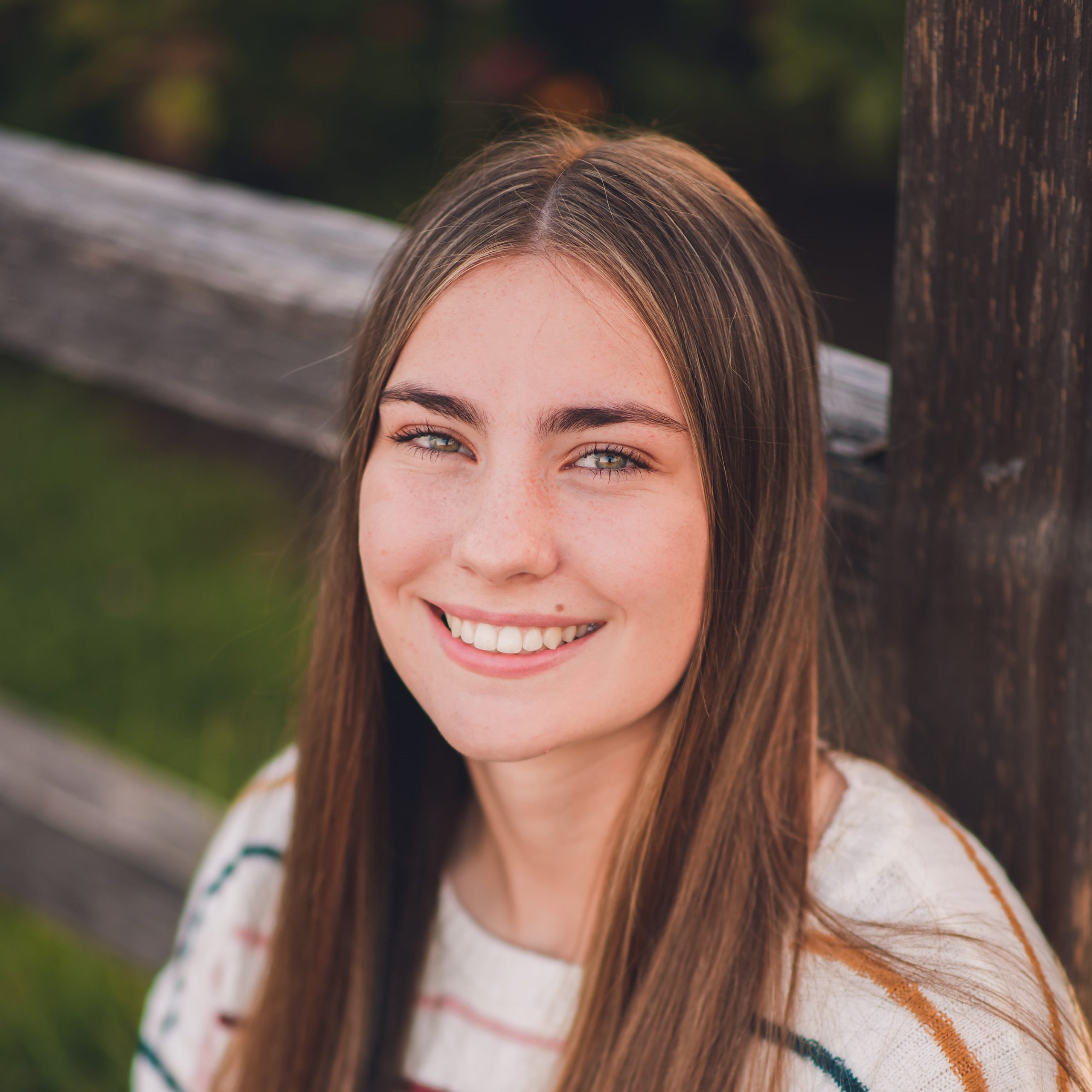 woman smiling in the outdoors