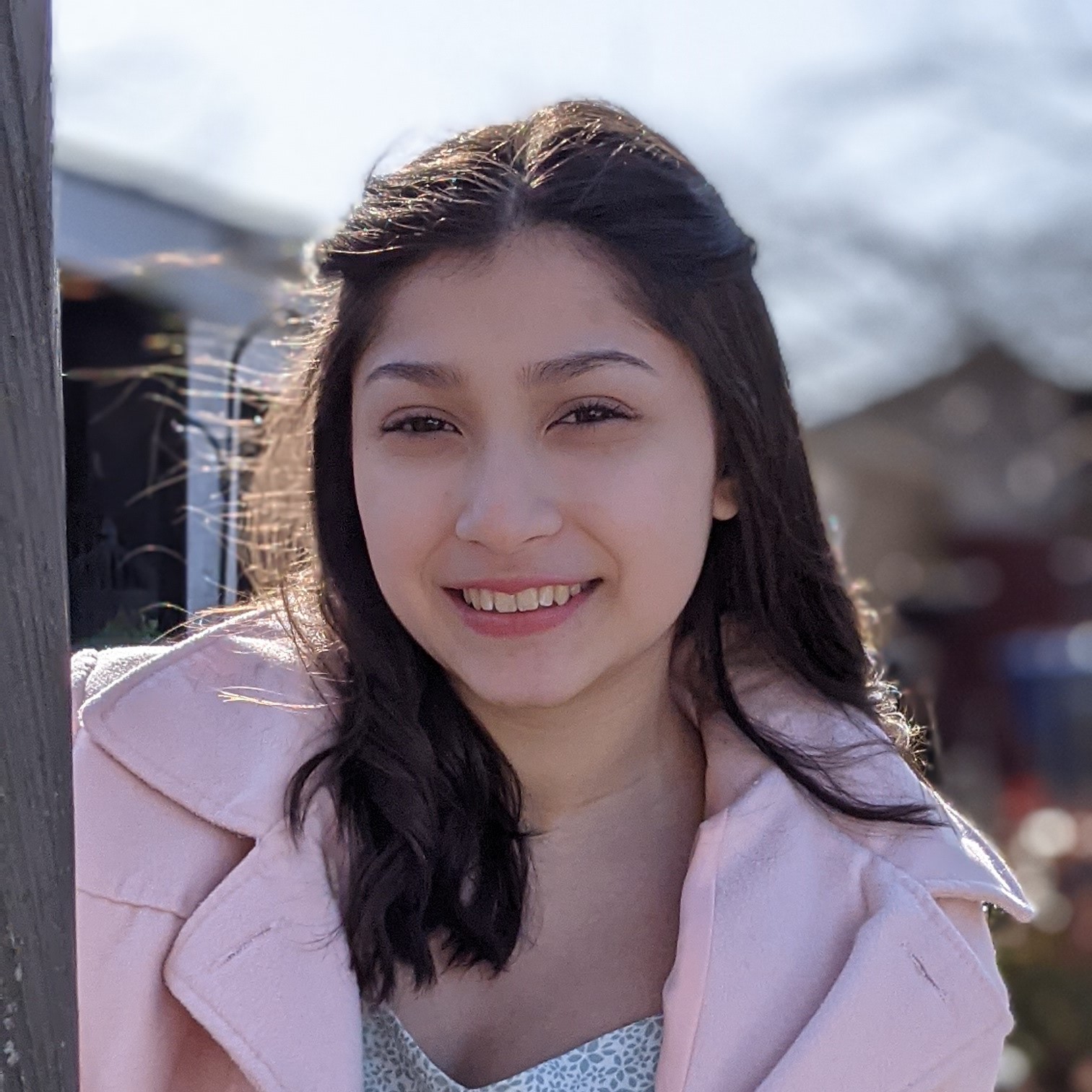 woman smiling in the outdoors