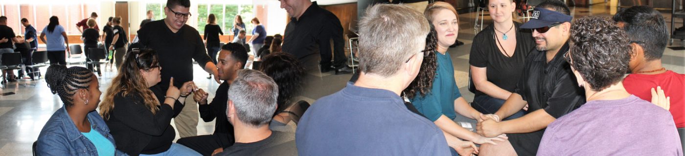 Deaf Interpreter Conference: multiple groups of people communicating using sign language.