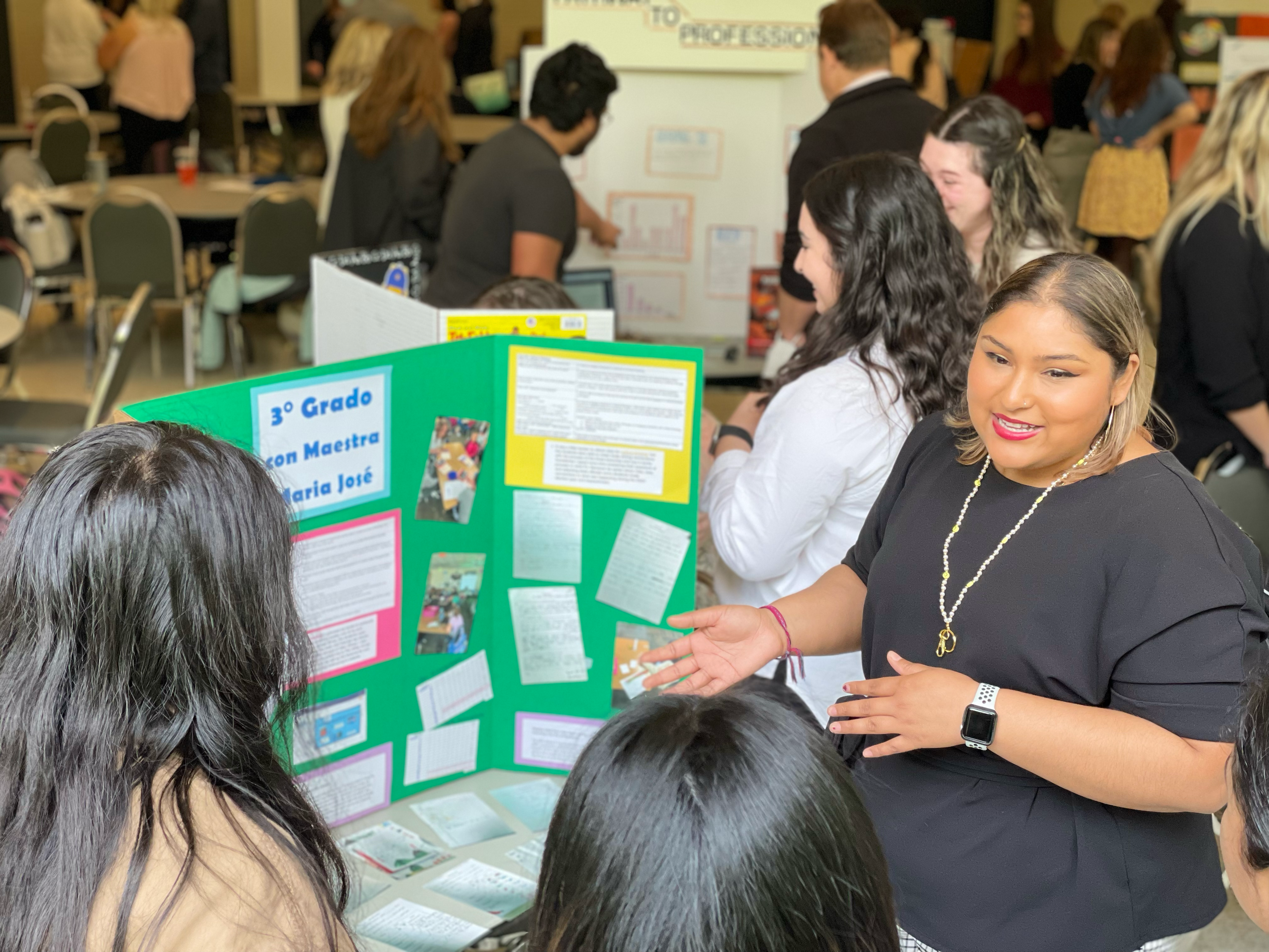 teacher presenting at a conference