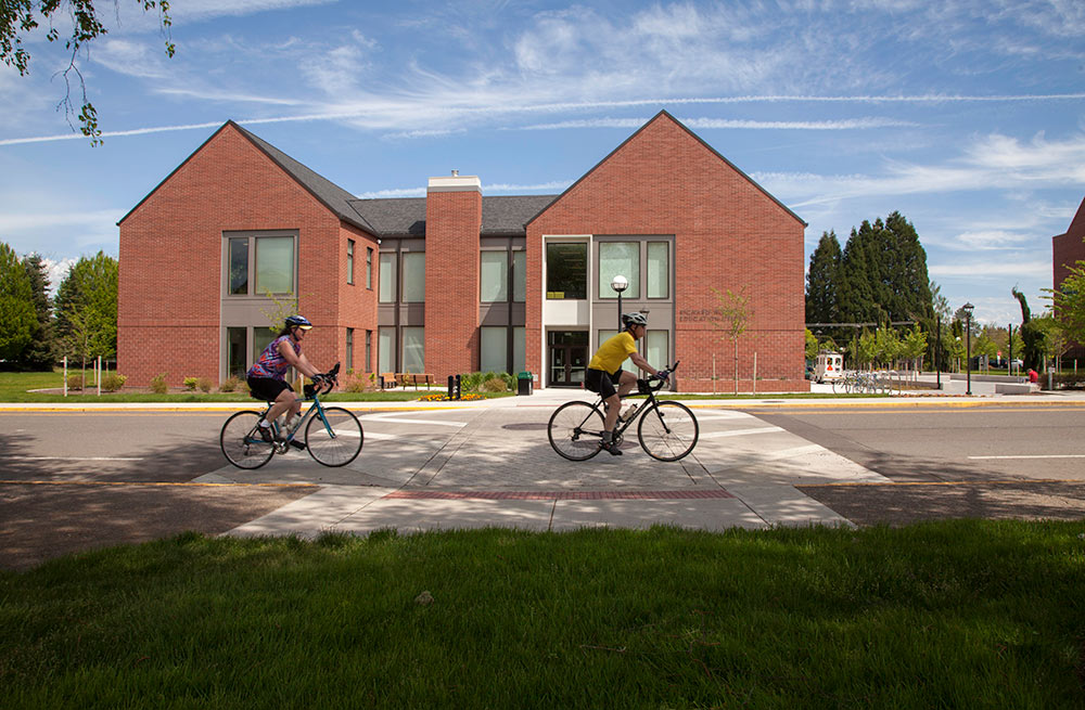 WOU library with bike riders