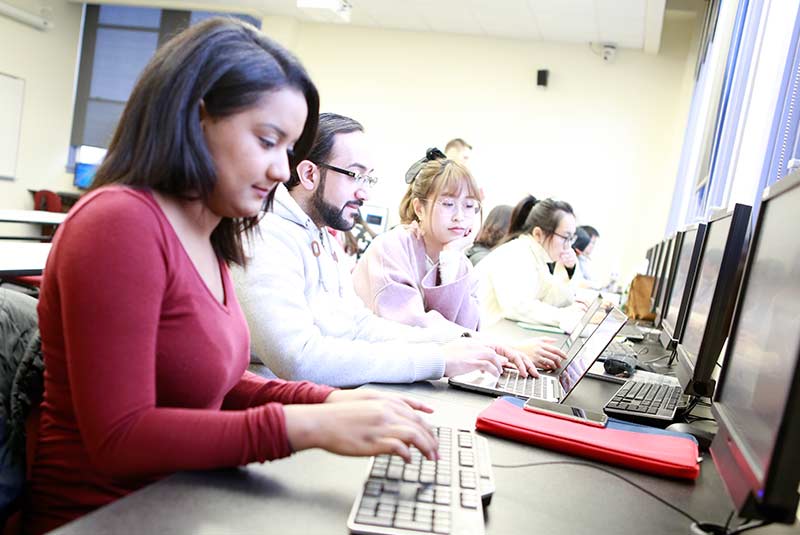 WOU student on computer